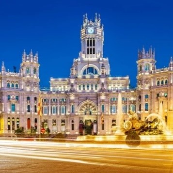 Cibeles Palace illuminated at night in Madrid