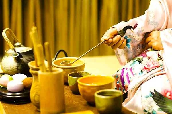 Japanese tea ceremony with matcha and traditional sweets