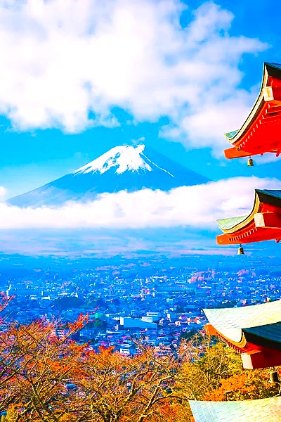 Snow-capped Mount Fuji with a red pagoda in the foreground, Japan
