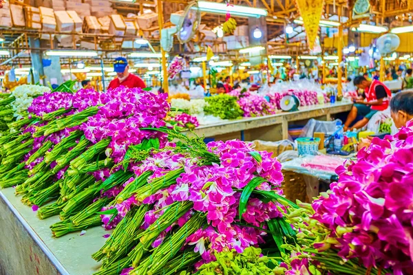 Bangkok flower market with purple orchids